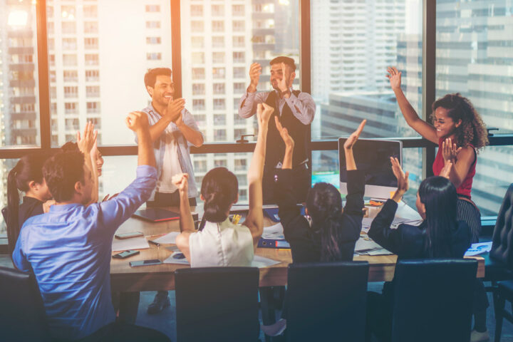 happy people in a conference room