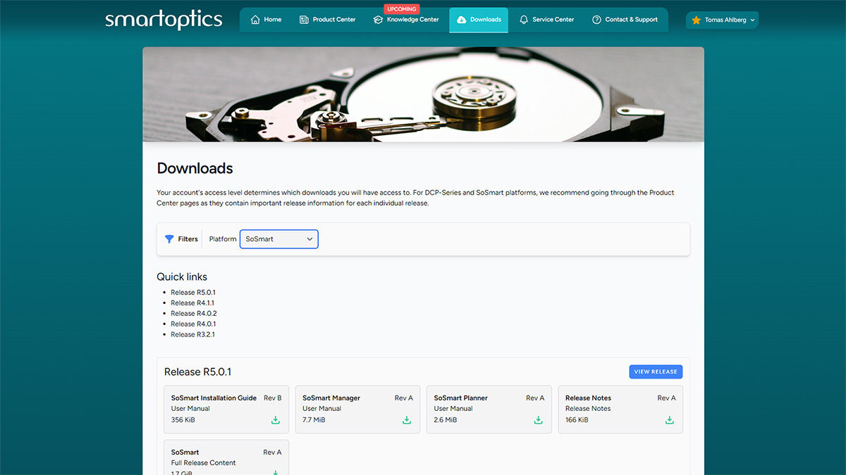 Smartoptics downloads page with file options, filters and a hard drive image at the top.